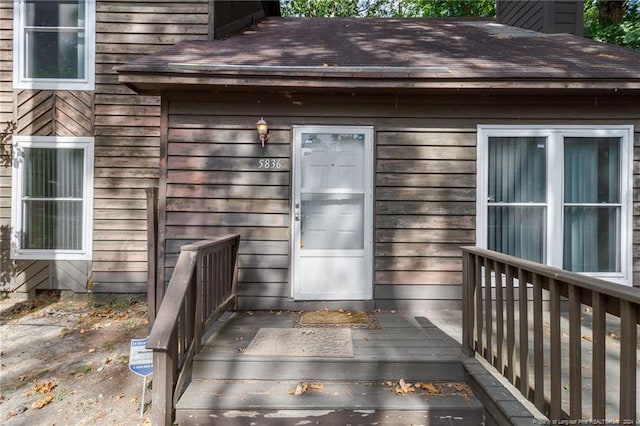 entrance to property featuring a deck