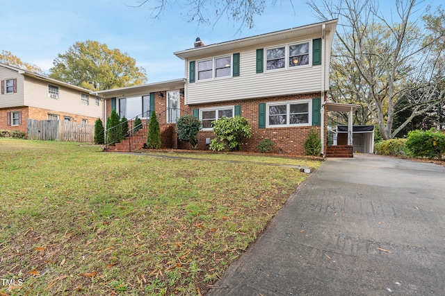 split level home featuring a front lawn