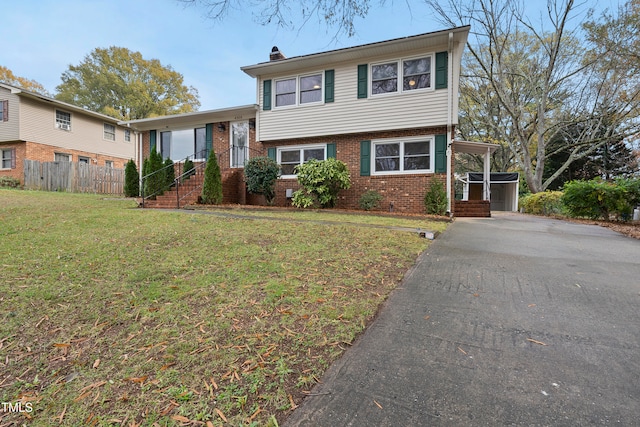 tri-level home featuring a front yard