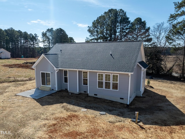 view of front of home with a shingled roof and crawl space