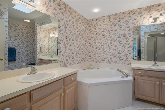 bathroom featuring vanity, separate shower and tub, ornamental molding, and a skylight