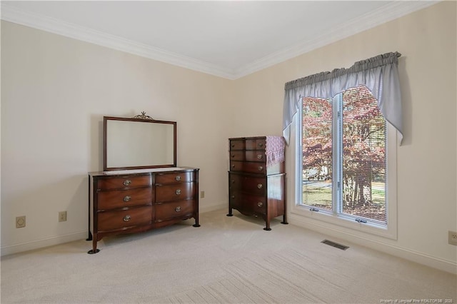 interior space with multiple windows, light carpet, and crown molding