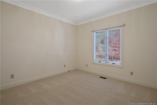 unfurnished room with light colored carpet and crown molding