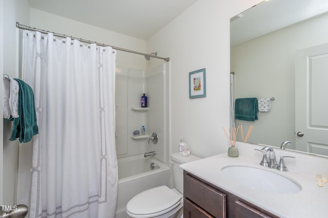 full bathroom featuring vanity, shower / bath combination with curtain, and toilet