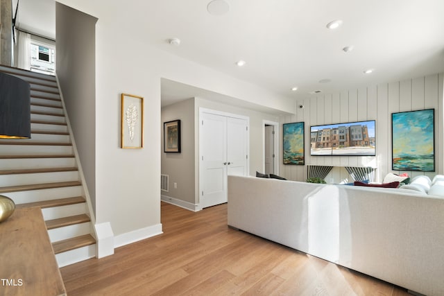 living room featuring a healthy amount of sunlight and light wood-type flooring