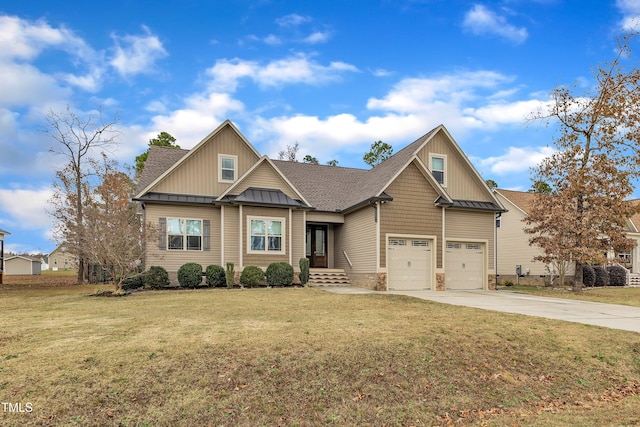 craftsman-style house featuring a front yard and a garage