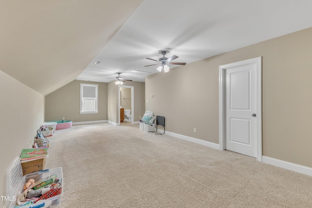 game room featuring ceiling fan, carpet floors, and vaulted ceiling