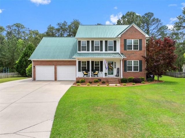 traditional-style home featuring covered porch, brick siding, driveway, and an attached garage
