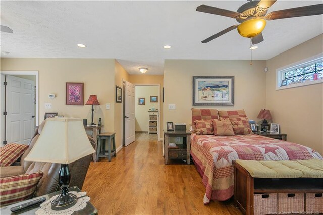 4402 Bluebush Dr, Fayetteville, NC 28312 - bedroom featuring a ceiling fan, light wood-style flooring, and recessed lighting