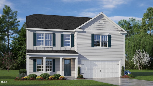 view of front facade with a garage and a front lawn