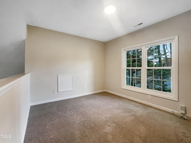 view of carpeted spare room