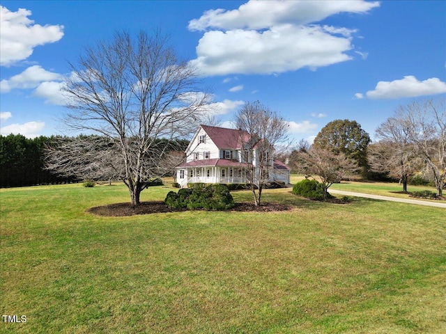 view of front of home with a front lawn