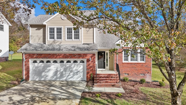 view of front of property with a garage