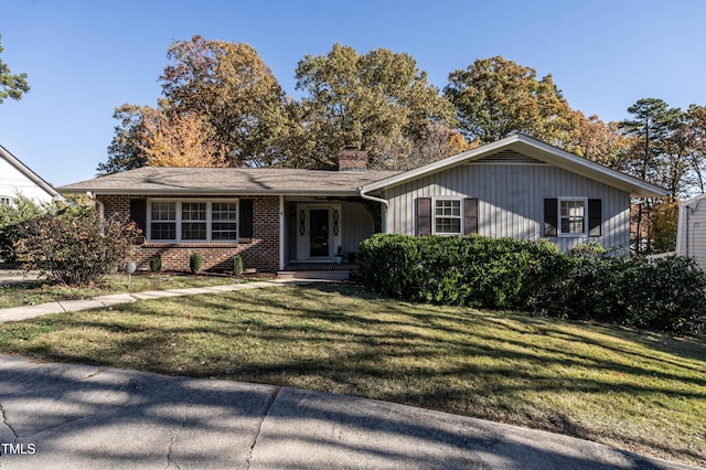 ranch-style home with a front yard