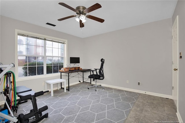 office space with ceiling fan