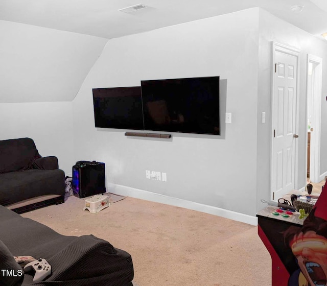 living room with carpet flooring and vaulted ceiling