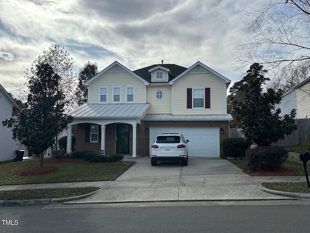 view of front of property with a garage