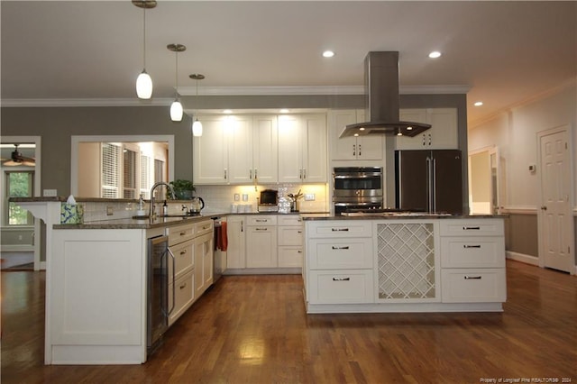 kitchen featuring pendant lighting, wine cooler, dark hardwood / wood-style floors, appliances with stainless steel finishes, and island exhaust hood