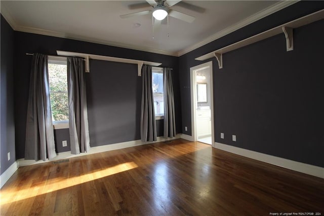 unfurnished room with crown molding, ceiling fan, and hardwood / wood-style flooring