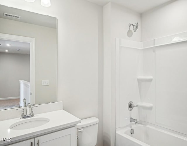 full bathroom featuring vanity,  shower combination, and toilet