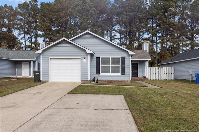 ranch-style house featuring a garage and a front lawn