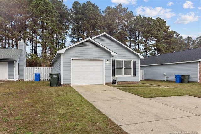 ranch-style house featuring a garage and a front lawn