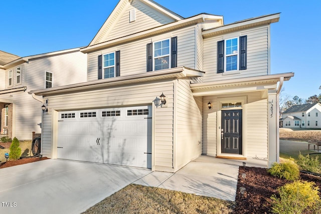 view of front of property featuring a garage