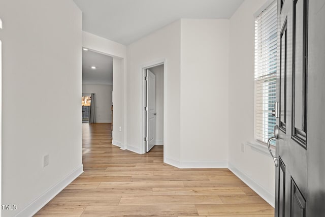 hallway featuring light wood-type flooring