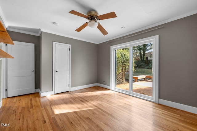 interior space featuring crown molding, ceiling fan, and light hardwood / wood-style floors