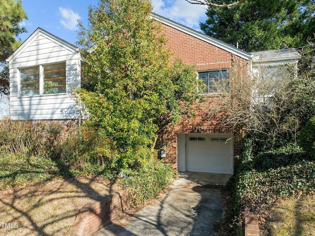 view of front of property with a garage