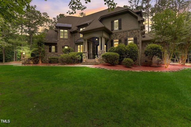 view of front of home featuring a yard