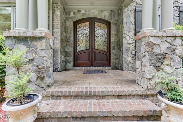 view of exterior entry with french doors