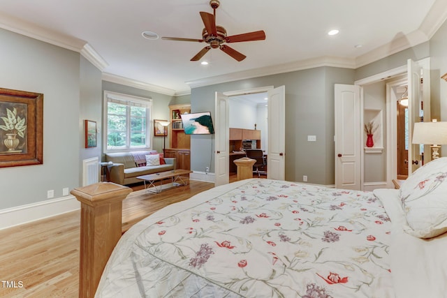 bedroom with ceiling fan, light hardwood / wood-style floors, and crown molding