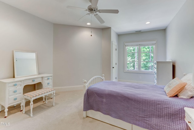 carpeted bedroom with ceiling fan