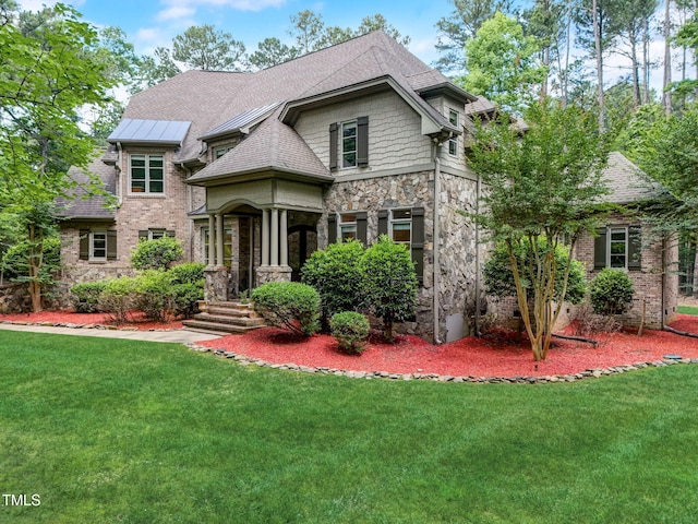 view of front facade with a front yard