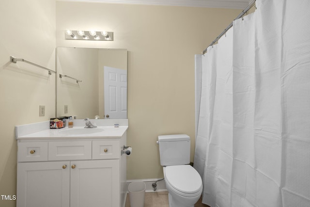 bathroom with tile patterned floors, curtained shower, vanity, and toilet