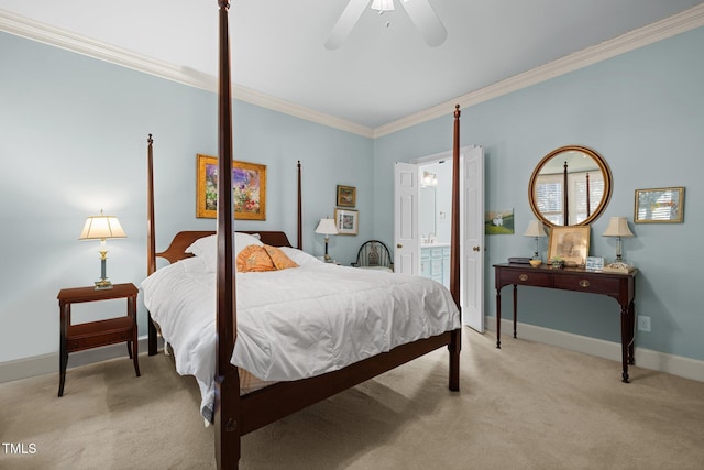 bedroom with light carpet, ceiling fan, ensuite bathroom, and ornamental molding