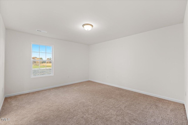 unfurnished room featuring carpet floors