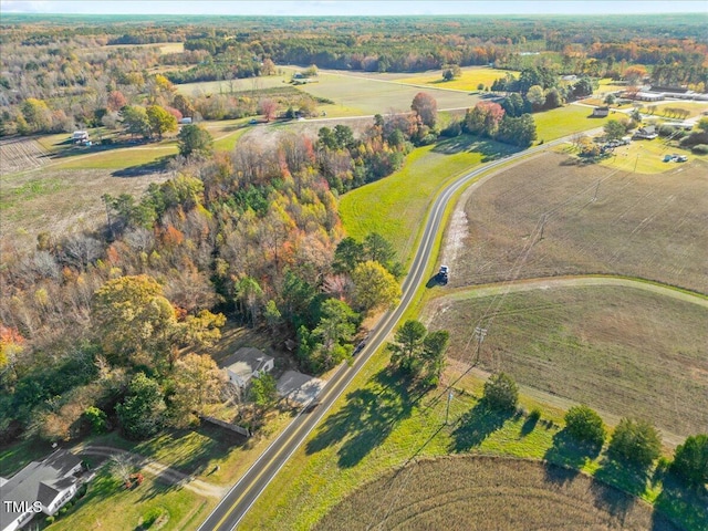 birds eye view of property featuring a rural view