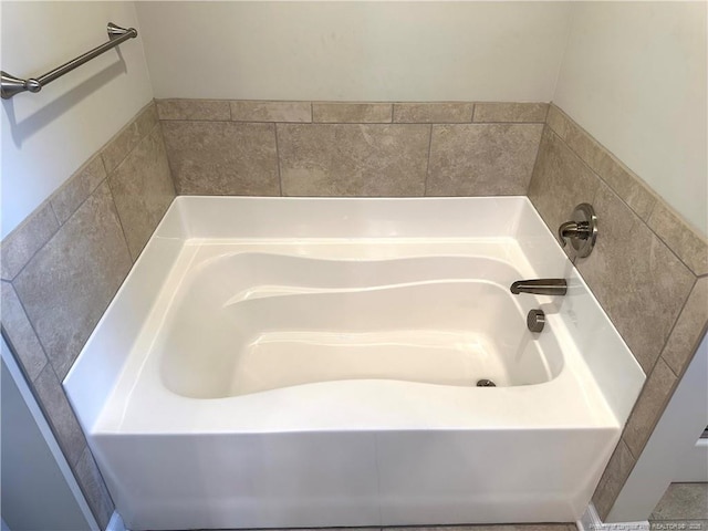 bathroom featuring a tub