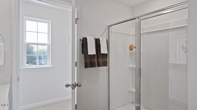 bathroom featuring walk in shower