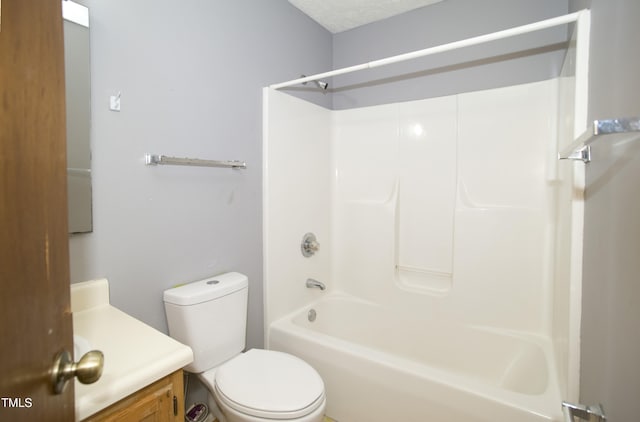 full bathroom featuring vanity, shower / bathtub combination, toilet, and a textured ceiling