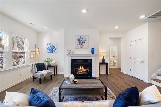 living room featuring dark hardwood / wood-style floors