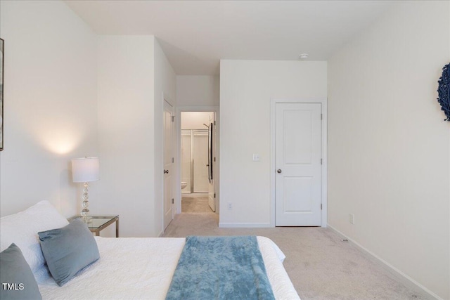 bedroom featuring light colored carpet and a closet