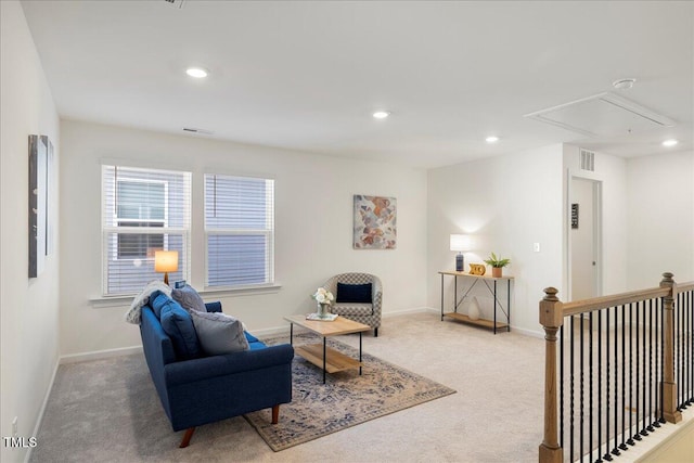 sitting room featuring carpet flooring