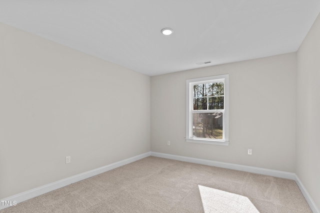 empty room featuring carpet flooring