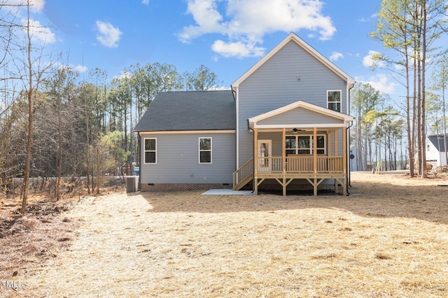 back of property featuring ceiling fan