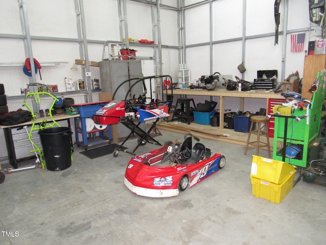 garage with a workshop area