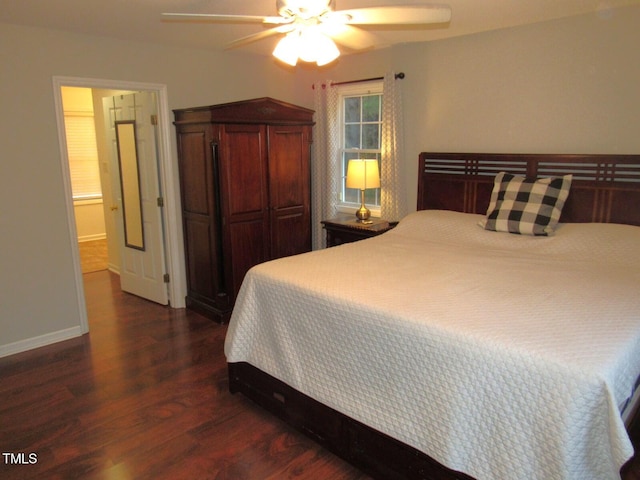 bedroom with ceiling fan and dark hardwood / wood-style flooring