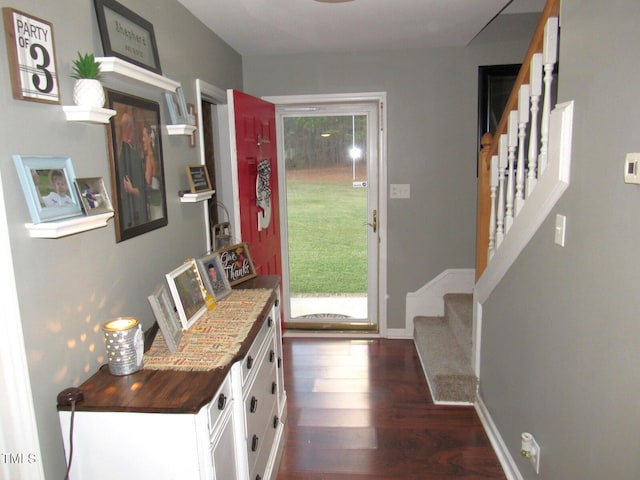 doorway featuring dark hardwood / wood-style floors